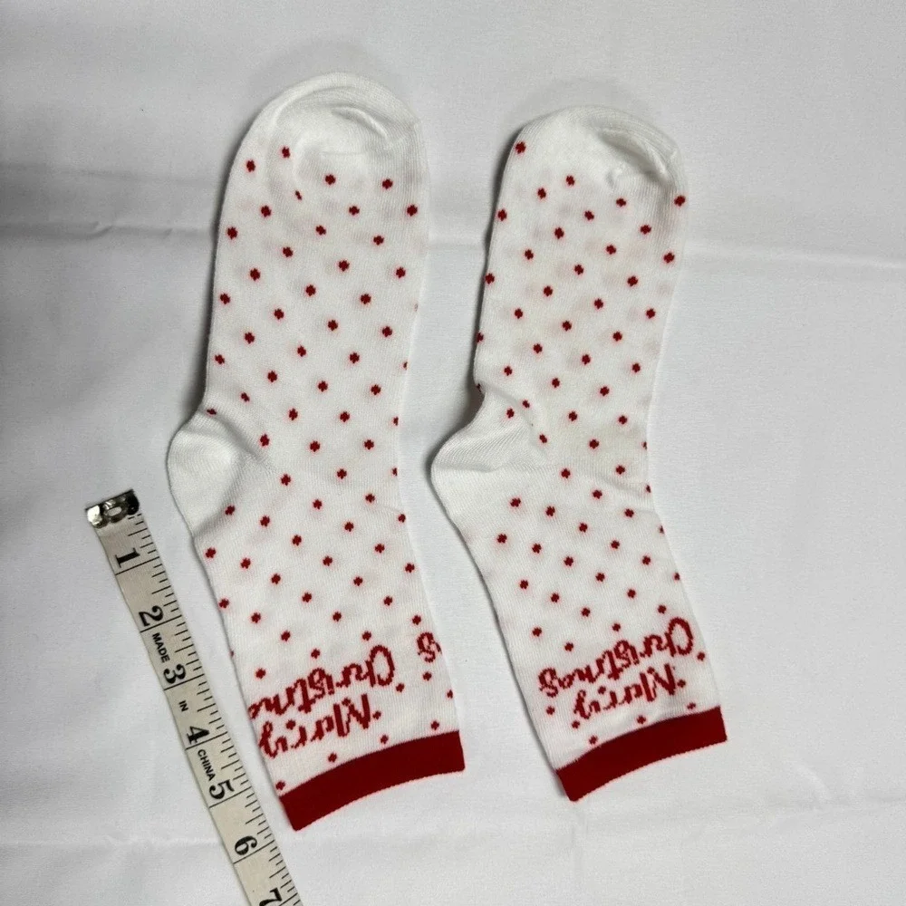 Women's Christmas-themed crew socks NEW in Bag.‎